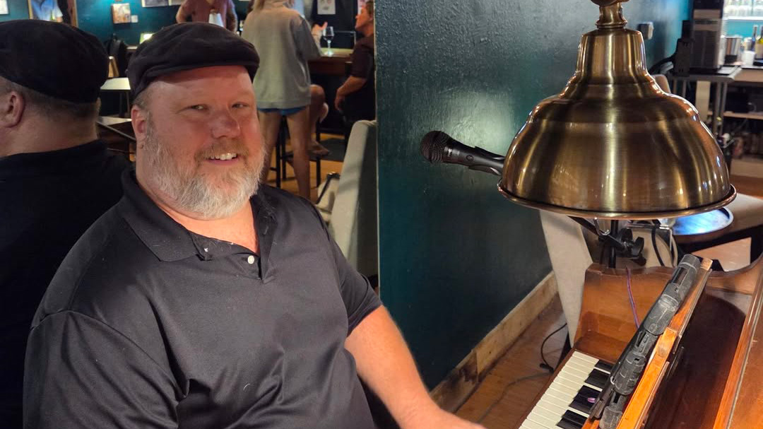 Tom Bennett performing live on piano at Cork Thyme at All Spiced Up in Historic Avondale, Jacksonville